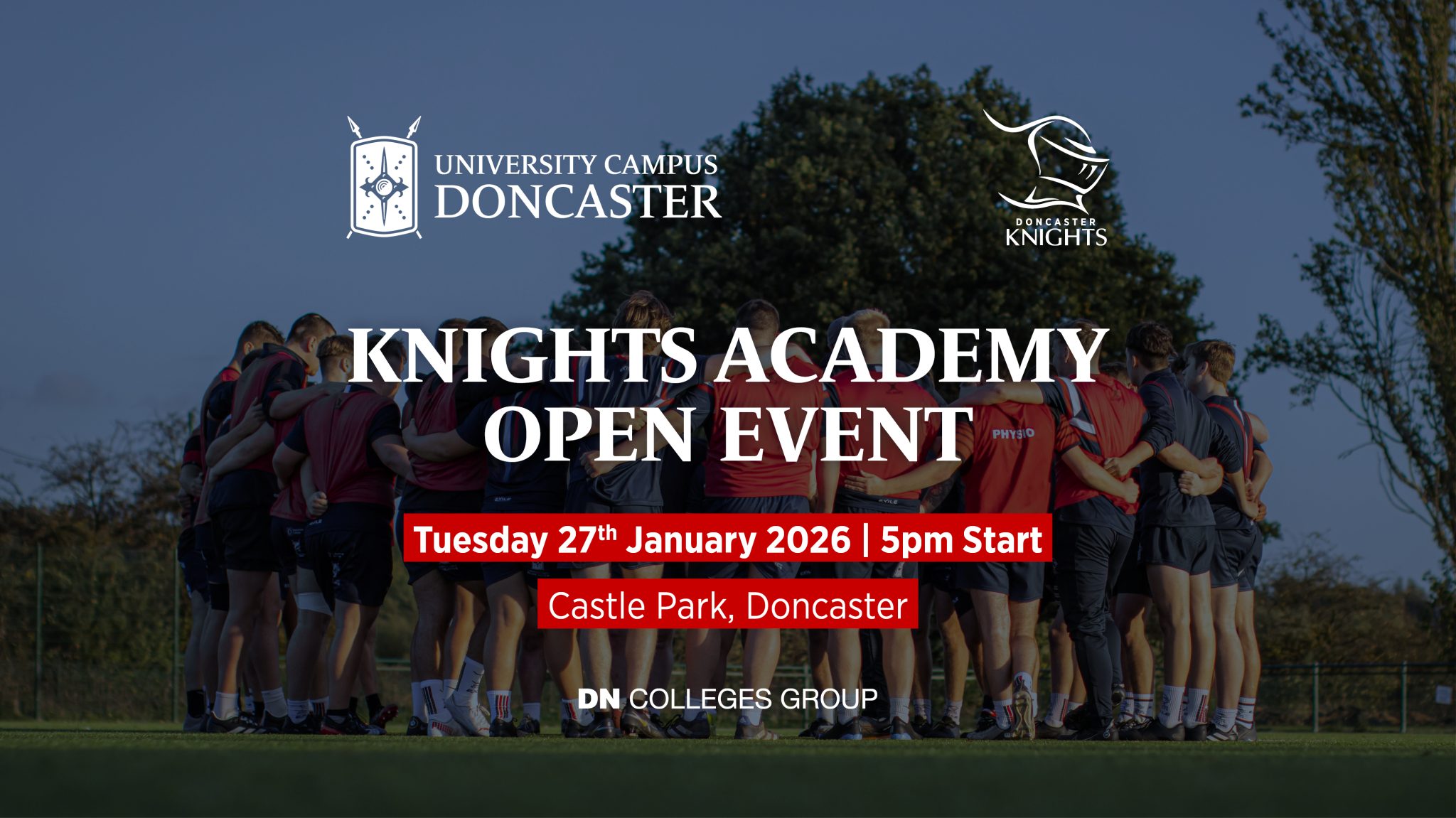 A vibrant promotional poster for the Knights Academy Open Event, co-hosted by University Campus Doncaster and Doncaster Knights. The background features a dynamic photo of rugby players in navy blue and red kits huddled together on a lush green field, framed by tall trees with early winter foliage under a pale blue sky. The players’ uniforms and body language convey energy, teamwork, and anticipation. Bold white uppercase text overlays the image, announcing: "KNIGHTS ACADEMY OPEN EVENT" with event details below in a clean, modern font: "Tuesday 27th January 2026 | 5pm Start" "Castle Park, Doncaster" The top left corner displays the University Campus Doncaster logo in white, while the bottom right features the Doncaster Knights and DN Colleges Group logos, adding institutional credibility and partnership emphasis. The overall color palette blends natural greens and blues with crisp whites and deep reds, creating a professional yet inviting atmosphere that highlights sport, education, and community engagement.